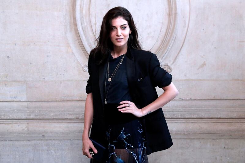 French-Lebanese Razane Jammal poses during a photocall before the Christian Dior women's 2018 Spring/Summer ready-to-wear collection fashion show in Paris, on September 26, 2017. (Photo by Patrick KOVARIK / AFP)