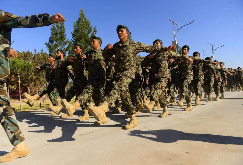 In this photo taken on November 19, 2018, newly-graduated Afghan National Army (ANA) cadets march during a graduation ceremony at the ANA training centre in Herat province. Since the start of 2015, when local forces took over from US-led NATO combat troops to secure the country, nearly 30,000 Afghan soldiers and police have been killed, President Ashraf Ghani revealed this month -- a figure far higher than anything previously acknowledged. - TO GO WITH AFP STORY AFGHANISTAN-UNREST,FOCUS BY ALLISON JACKSON
 / AFP / HOSHANG HASHIMI / TO GO WITH AFP STORY AFGHANISTAN-UNREST,FOCUS BY ALLISON JACKSON
