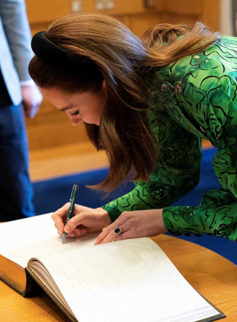 Catherine, Duchess of Cambridge, signs the guestbook after a meeting with Ireland's Taoiseach Leo Varadkar at Government Buildings in Dublin, Ireland. Reuters