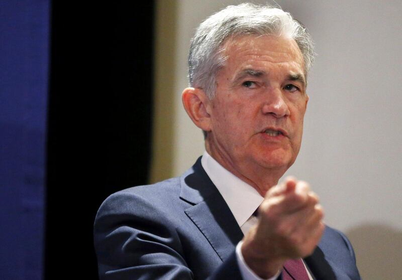 FILE - In this Tuesday, Oct. 2, 2018, file photo, Federal Reserve Chairman Jerome Powell speaks at the annual meeting of the National Association for Business Economics, in Boston. Speaking Wednesday, Nov. 14, 2018, to an audience at the Federal Reserve Bank of Dallas, Powell said the U.S. economy is performing well but he's eyeing potential risks ahead. (AP Photo/Elise Amendola, File)