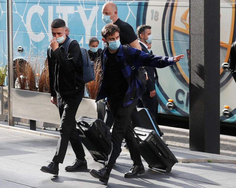 Manchester Cit's Phil Foden arrives at the team hotel with teammates. Reuters