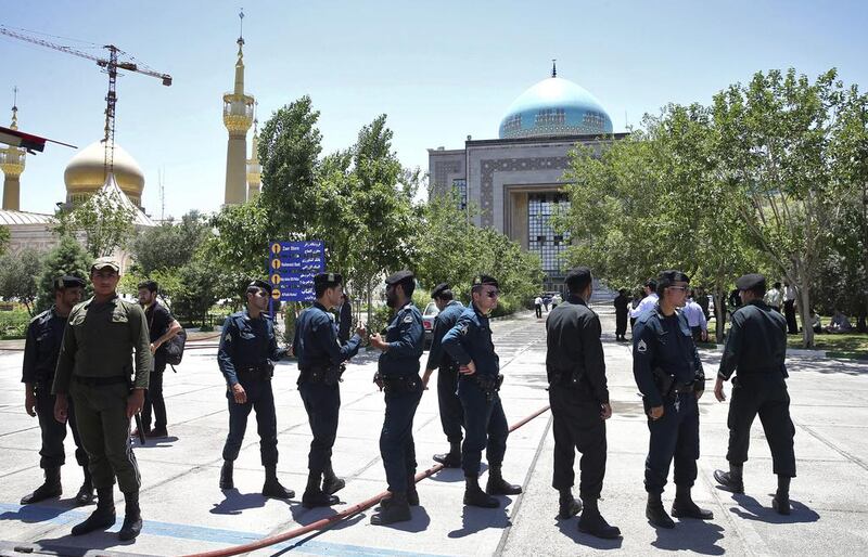 Police officers outside the shrine of the late Iranian revolutionary founder Ayatollah Khomeini, after an assault of several attackers in Tehran on June 7, 2017. Ebrahim Noroozi/AP Photo