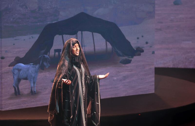 An artist performs a scene about the Prophet Mohammed's journey from Makkah to Medina. AFP