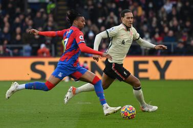 LONDON, ENGLAND - JANUARY 23: Michael Olise of Crystal Palace is challenged by Virgil van Dijk of Liverpool during the Premier League match between Crystal Palace  and  Liverpool at Selhurst Park on January 23, 2022 in London, England. (Photo by Mike Hewitt / Getty Images)
