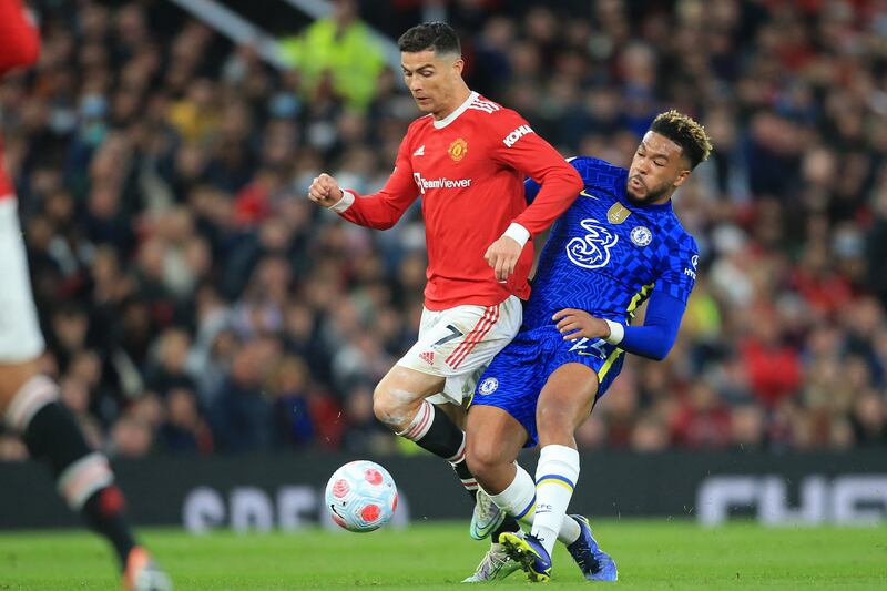Manchester United striker Cristiano Ronaldo battles with Chelsea defender Reece James during the 1-1 Premier League draw on April 28.  AFP