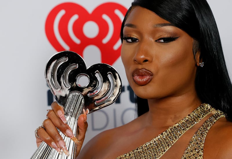 Megan Thee Stallion poses with her award for Best Collaboration at the 2021 iHeartRadio Music Awards at Dolby Theatre in Los Angeles, California, U.S., May 27, 2021. REUTERS/Mario Anzuoni