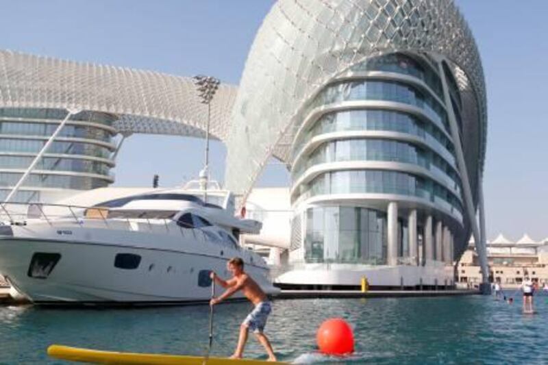 January 27. First place winner in the Stand Up Paddle board competition held at Yas Marina, Daniel Van Dooren (Dubai resident and owner of Surf Dubai) sets a quick pace to finish in 46minutes. January 27, Abu Dhabi, United Arab Emirates (Photo: Antonie Robertson/The National)