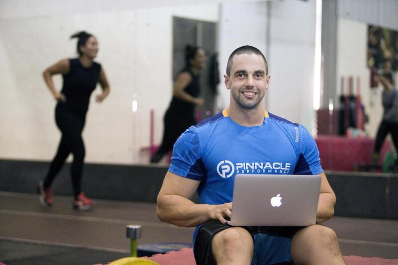 Kelvin Garner of Pinnacle Performance says online personal training is a good option for those who can’t commit to specific times, such as women with young children. Jaime Puebla / The National