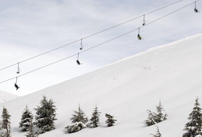 BEIRUT, LEBANON - JANUARY 16: Lebanese and tourists ride a ski lift at the Lebanese Mzaar Kfardebian ski area where peaks range between 2800 meters above sea level, in the mountains one hour away from Beirut on January 16, 2015 in Lebanon.  (Photo by Bilal Jawich/Anadolu Agency/Getty Images)