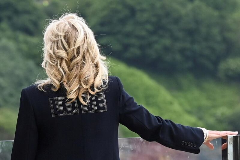 US first lady Jill Biden wears a jacket with the word "Love" at Carbis Bay, Cornwall, Britain. Reuters