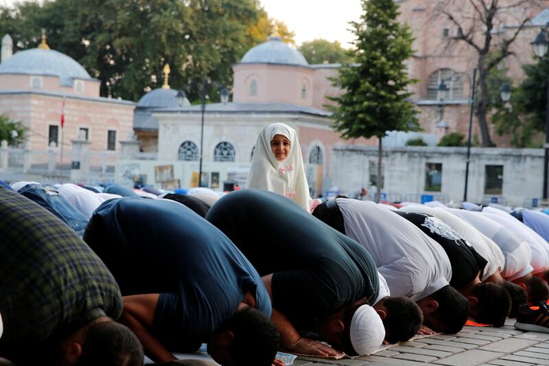 Prayers on the first day of Eid Al Adha outside the Ayasofya-i Kebir Camii or Hagia Sophia Grand Mosque in Istanbul, Turkey. Reuters 