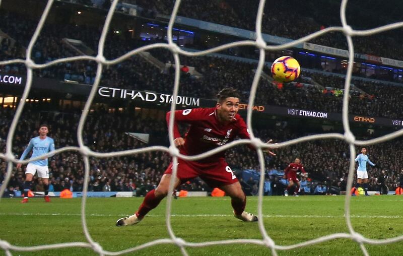 Roberto Firmino scores their first goal. Action Images via Reuters
