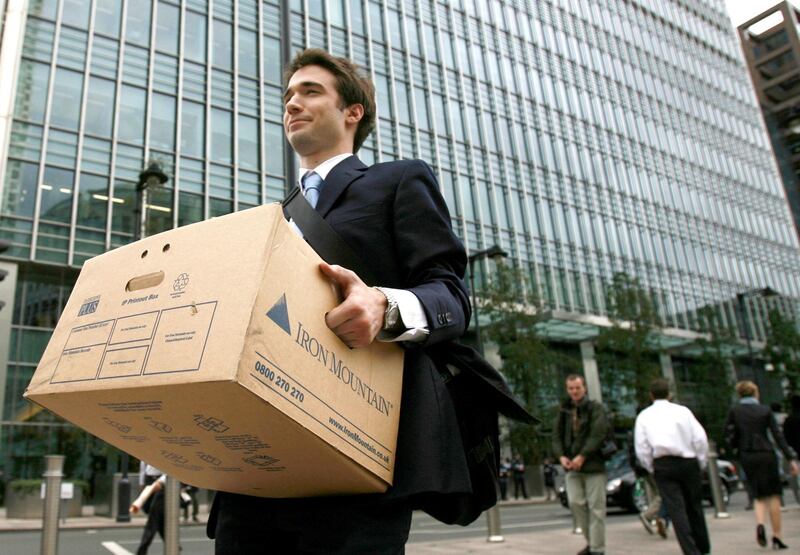 A worker is seen carrying a box out of the U.S. investment bank Lehman Brothers offices, in the Canary Wharf district of London in this September 15, 2008 file photograph. Some creditors of Lehman Brothers International  (Europe) will likely lose their money, but it will take a long time before it becomes clear how much, administrators Pricewaterhouse Coopers (PwC) said on November 14, 2008.   Photograph taken on September 15, 2008.   REUTERS/Andrew Winning/Files (BRITAIN) - LM1E4BE1C2H01