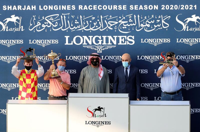 Sharjah, United Arab Emirates - November 28, 2020: Winner of the fifth race Galvanize ridden by Nathan Crosse (red and yellow), in the Sheikh Hamdan bin Rashid Al Maktoum Cup for thoroughbreds. Saturday, November 28th, 2020 in Sharjah. Chris Whiteoak / The National