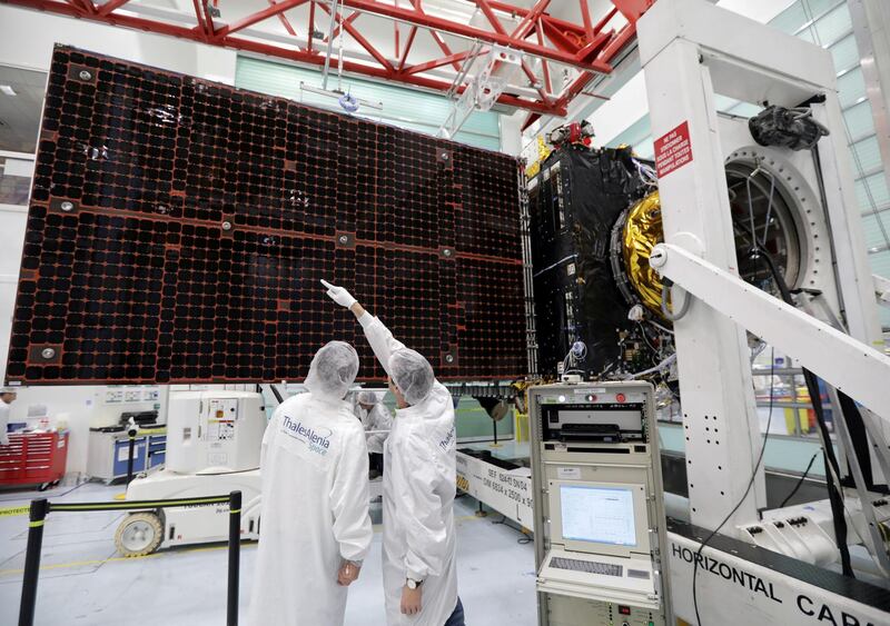 FILE PHOTO: A technician looks at a solar panel on the Inmarsat S-Band/Hellas-Sat 3 satellite in the clean room facilities of the Thales Alenia Space plant in Cannes, France, February 3, 2017.   REUTERS/Eric Gaillard/File Photo