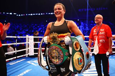 ABU DHABI, UNITED ARAB EMIRATES - NOVEMBER 05: Chantelle Cameron celebrates with the IBF, IBO, WBA, WBC and WBO World Title belts after victory in the IBF, IBO, WBA, WBC, WBO, Undisputed Super-Lightweight Championship Title fight between Chantelle Cameron and Jessica McCaskill at Etihad Arena on November 05, 2022 in Abu Dhabi, United Arab Emirates. (Photo by Francois Nel / Getty Images)