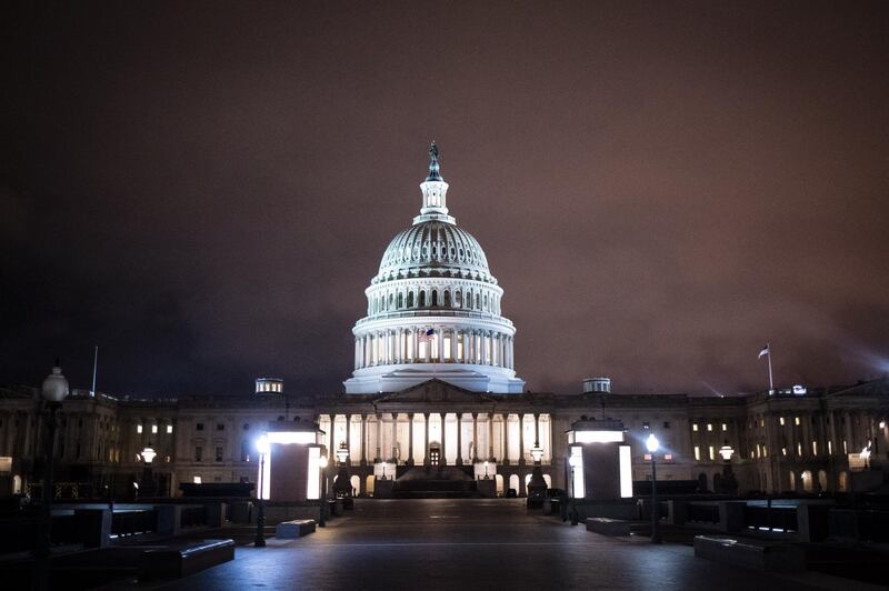 The U.S. Capitol building stands illuminated at night in Washington, D.C., U.S., on Wednesday, March 25, 2020. The U.S. Senate approved a historic $2 trillion rescue plan to respond to the economic and health crisis caused by the coronavirus pandemic, putting pressure on the Democratic-led House to pass the bill quickly and send it to President Donald Trump for his signature. Photographer: Al Drago/Bloomberg