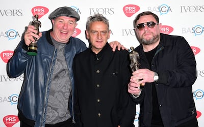 Left to right, Mark Day, Paul Ryder and Shaun Ryder of The Happy Mondays with the Inspiration Award during the 61st Annual Ivor Novello Music Awards. Photo: PA