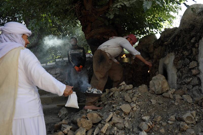 Iraqi Yezidis visit the Temple of Lalish, in a valley near the Kurdish city of Dohuk about 430km northwest of the capital Baghdad, on July 16, 2019. AFP