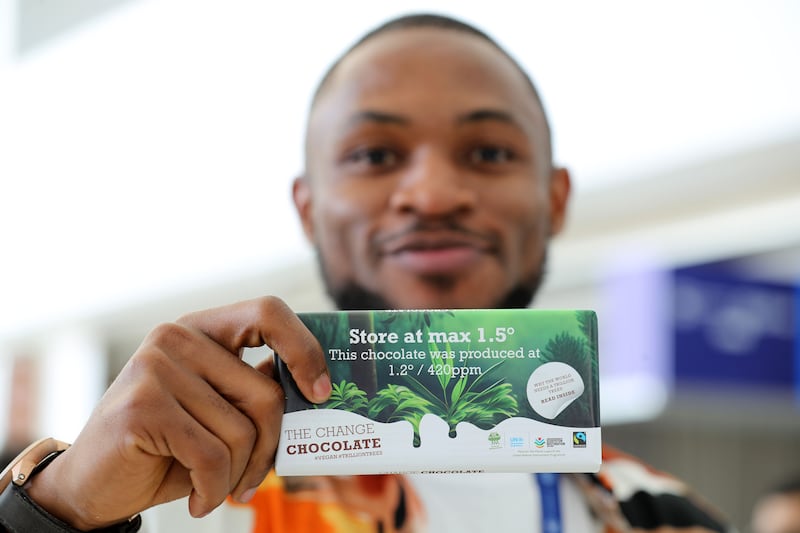 Fair-trade vegan chocolate being handed out at Cop28. Chris Whiteoak / The National