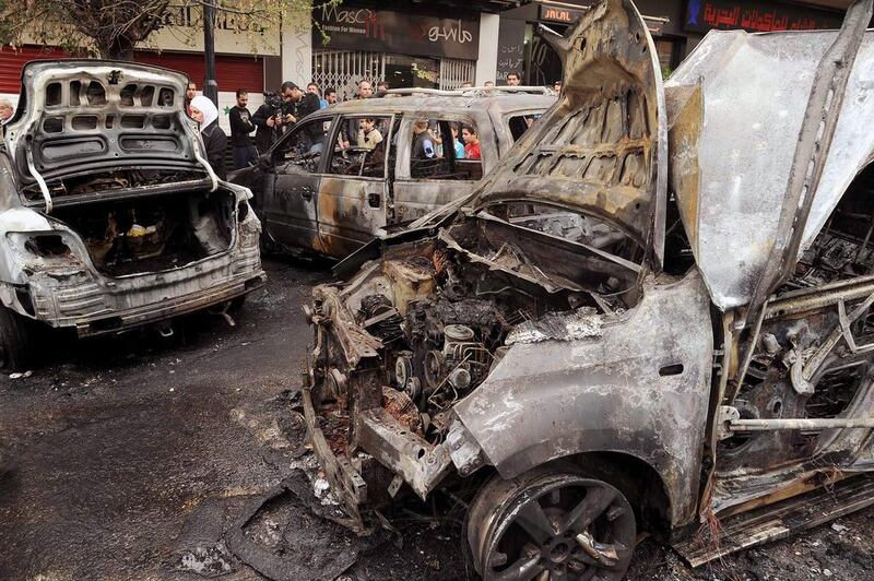 Damaged cars at the site of an explosion in the Mazzeh area of Damascus on March 24. According to state-media SANA, an explosive device planted by ‘terrorists’ in a parked car cased material damage with no causalities reported. SANA / EPA