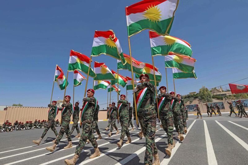 Iraqi-Kurdish Peshmerga officers take part in a graduation ceremony in Erbil, the capital of Iraq's northern autonomous Kurdish region. AFP