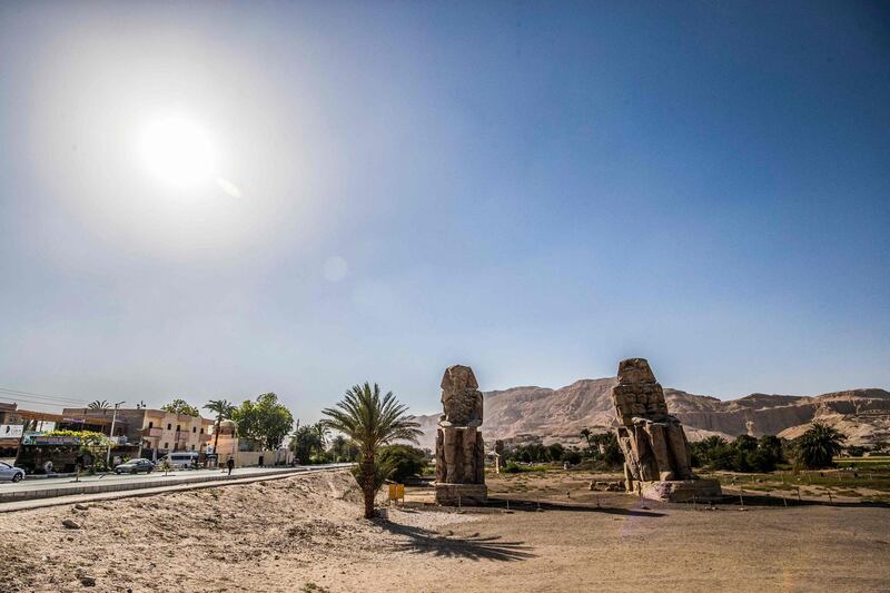 The Colossi of Memnon are two massive stone statues of the 18th dynasty Egyptian pharaoh Amenhotep III (c1391-1351 BC), on the west bank of the Nile outside Luxor. AFP