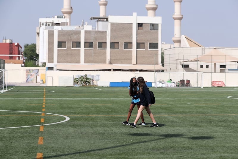 Students cross the playing field at the British School Al Khubairat in Abu Dhabi. The school has undergone dramatic and extensive redevelopment in the last decade to modernise its facilities.