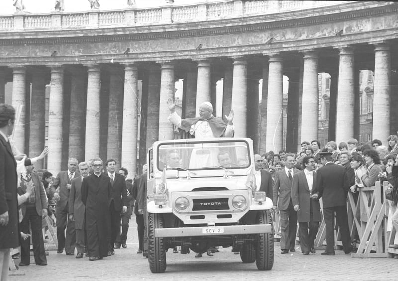 Pope John Paul II greets people at the Vatican City in 1979. (Photo by Archivio Cicconi/Getty Images)