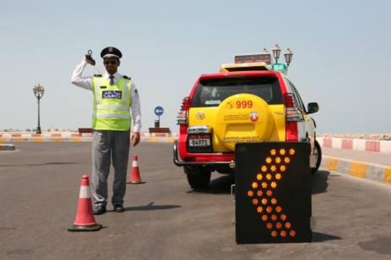 18-Sep-2011, Abu Dhabi. 
Department of Transportation. The Road Service Petrol is new service that cooperates with the police during car accidents or helping many passengers if they have technical problems in their cars. Fatima Al Marzouqi/ The National
