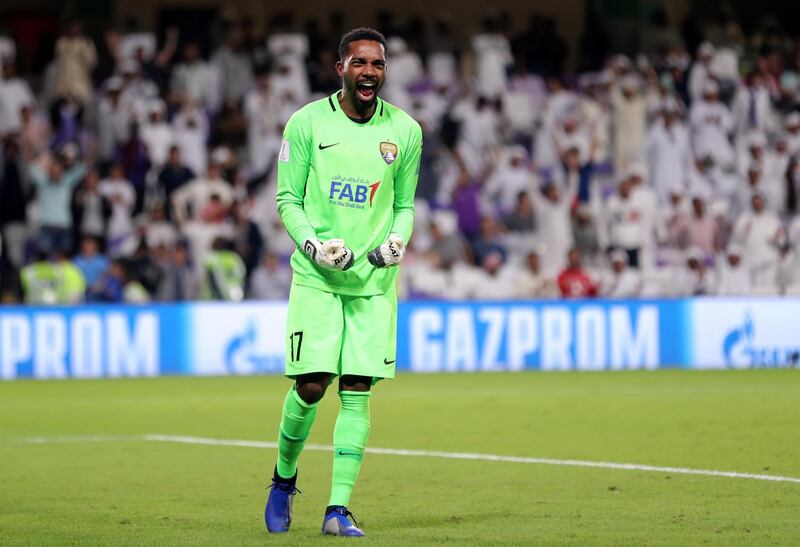 Al Ain, United Arab Emirates - December 12, 2018: Al Ain's Khalid Eisa celebrates after winning on penalties 4-3 after the game between Al Ain and Team Wellington in the Fifa Club World Cup. Wednesday the 12th of December 2018 at the Hazza Bin Zayed Stadium, Al Ain. Chris Whiteoak / The National