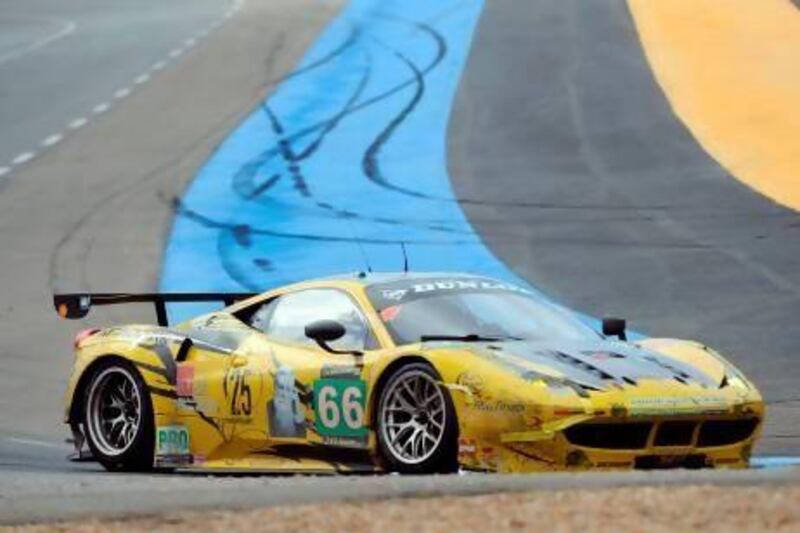 The Ferrari 458 driven by Emirati driver Khaled Al Qubaisi competes during the 24 Hours of Le Mans.