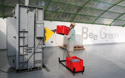 ABU DHABI, UNITED ARAB EMIRATES, Jan 14  – 2020 :-  Ahmed Al Jilani from Zayed Higher Organization for People of Determination putting plastic bottles into the crushing machine during the recycling workshop held at Zayed Agricultural Center for Development and Rehabilitation in Abu Dhabi. (Pawan Singh / The National) For News. Story by Haneen