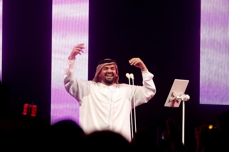 Emirati vocalist Hussain Al Jassmi sings at the event at Al Maryah Island in Abu Dhabi. Jeffrey E Biteng / The National
