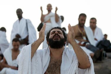 Muslim Hajj pilgrims pray during the Hajj pilgrimage at Mount Arafat. EPA/STR