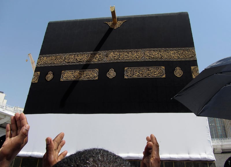Muslim pilgrims pray in front of the Kaaba ahead of Hajj in Makkah, Saudi Arabia. AP