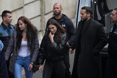The four suspects are appealing a Romanian judge's decision to detain them for 30 days. AP 