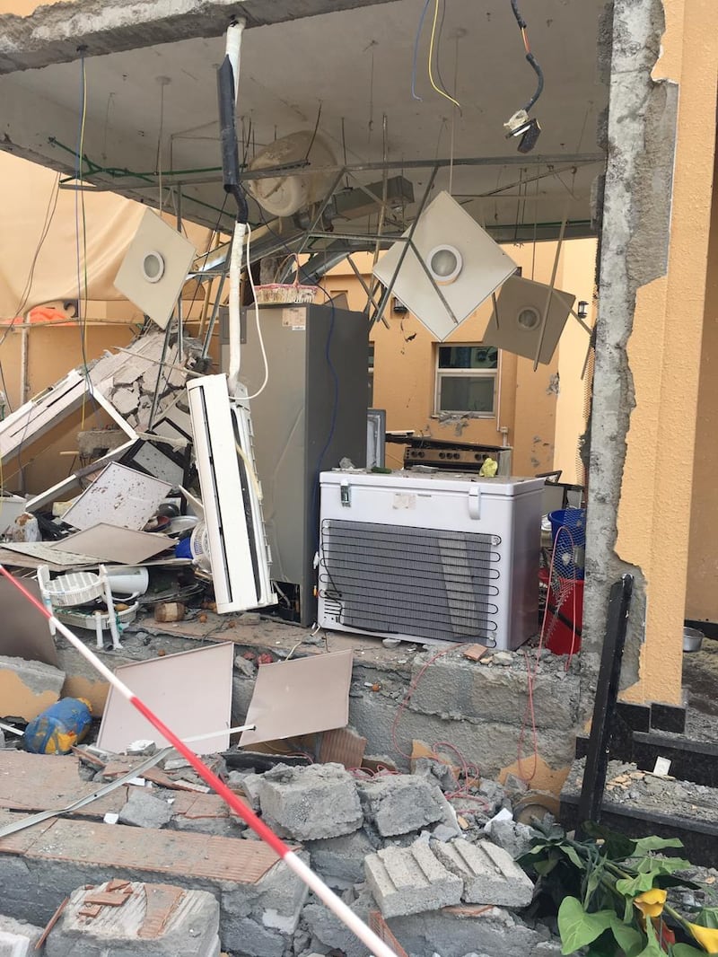 A woman is injured after the outside kitchen of a house in Al Ruqayeb explodes due to a gas leak. Courtesy Ajman Civil Defence