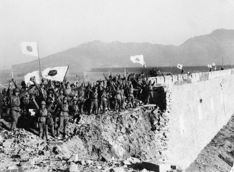 Japanese troops celebrate the fall of Nanking, China, in 1937. Japan occupied parts of China until 1945. Bettmann