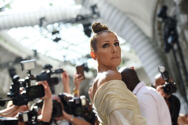 Canadian singer Celine Dion poses as she arrives for the Alexandre Vauthier Women's Fall-Winter 2019/2020 Haute Couture collection fashion show in Paris, on July 2, 2019. / AFP / Lucas BARIOULET