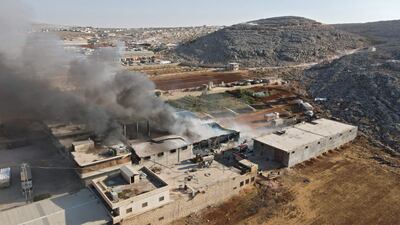 Smoke billows from a warehouse in Sarmada in Idlib province. AFP