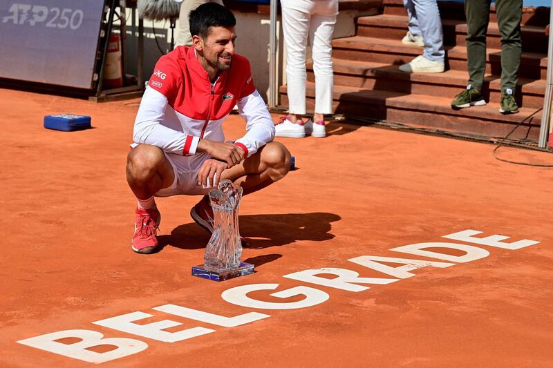 Serbia's Novak Djokovic poses the trophy in Belgrade. AFP
