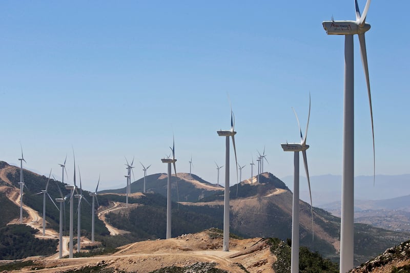 Windmills operated by Saudi's Acwa Power in Tangier, Morocco. In 2021, the Riyadh utility developer achieved financial closes of five projects in Saudi Arabia, South Africa and Uzbekistan. Reuters