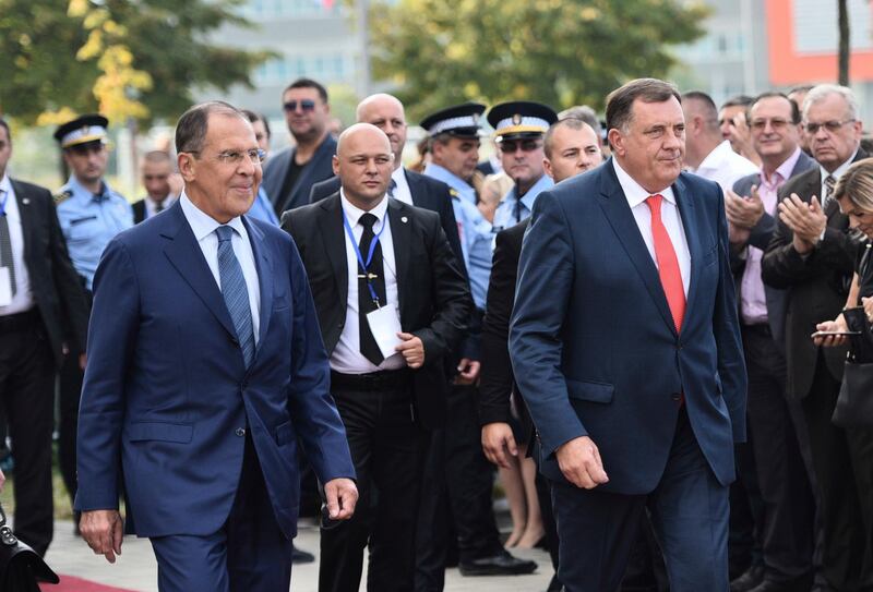 Minister of Foreign Affairs of Russia Sergei Lavrov, left, accompanied by President of Republic of Srpska, a region of Bosnia-Herzegovina,  Milorad Dodik, right, arrives in Banja Luka, 240 kms northwest of Sarajevo, Bosnia, on Friday, Sept. 21, 2018. Lavrov arrived in Bosnia on a one-day official visit.(AP Photo/Radivoje Pavicic)