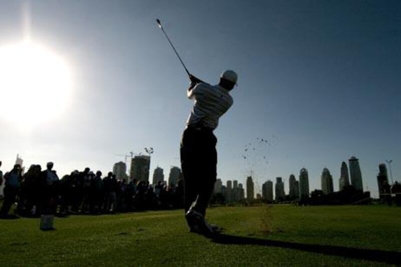 Worlds number one player Tiger Woods tees off on the 8th hole of Majlis course during the Dubai Desert Classic Charity match at Emirates Golf Club in Dubai. United Arab Emirates, Tuesday, January 29,2008. { Photo by Paulo Vecina }