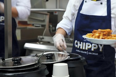 Gravy and chips at The Chippy on Reem Island, Abu Dhabi. The National / Andrew Scott