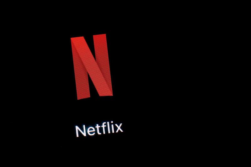 FILE- This March 19, 2018, file photo shows the Netflix app on an iPad in Baltimore. Netflix, Inc. reports earnings Tuesday, Oct. 16. (AP Photo/Patrick Semansky, File)