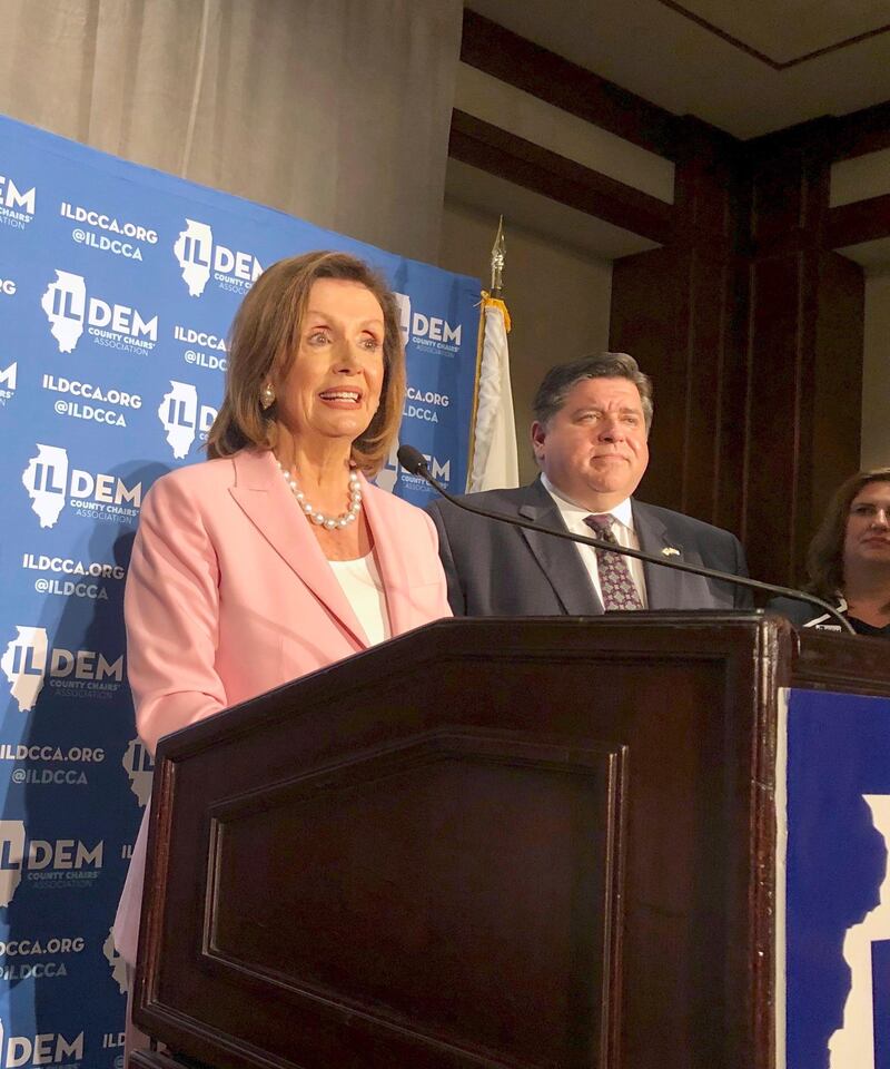 U.S. House Speaker Nancy Pelosi answers reporters' questions after keynoting the Illinois Democratic County Chairs' Association brunch Wednesday, August 14, 2019 at the Illinois State Fair in Springfield. The California Democrat exhorted about 2,200 Democrats at the event to defeat Republican President Donald Trump and give Democrats a U.S. Senate majority in 2020. (AP Photo/John O'Connor)