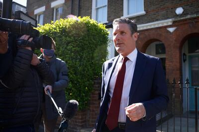 Britain's Labour Party leader Keir Starmer leaves his home in London on May 7, 2021.  Early results from nationwide local elections on May 7 showed that the ruling Conservative Party had won a landslide in the opposition stronghold of Hartlepool in northeast England, a bitter blow to the Labour Party and its leader Keir Starmer.  / AFP / Tolga Akmen
