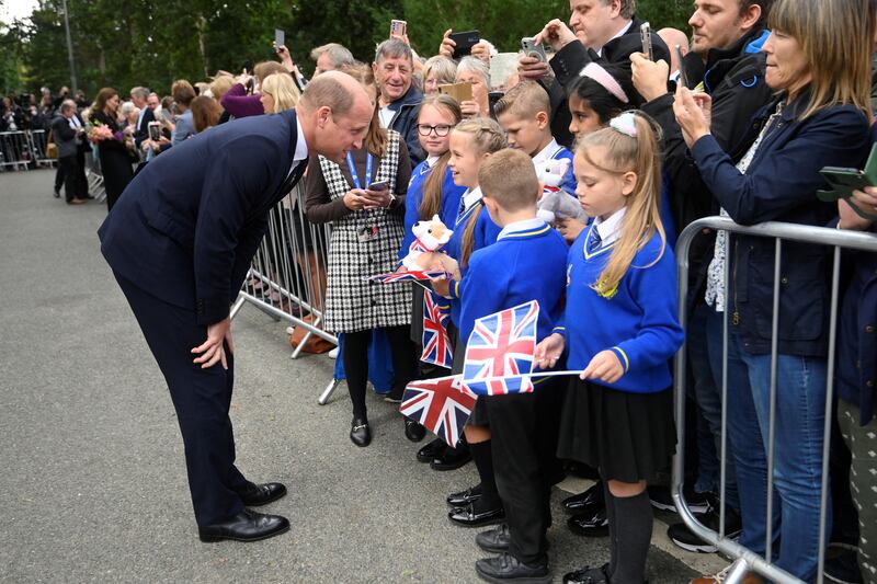 Prince William greets pupils from Howard Junior School. Getty Images